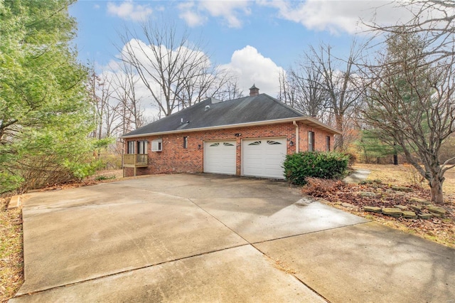 view of home's exterior with a garage