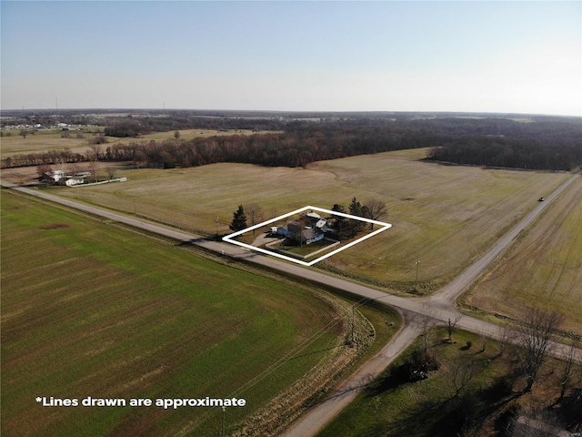 birds eye view of property featuring a rural view