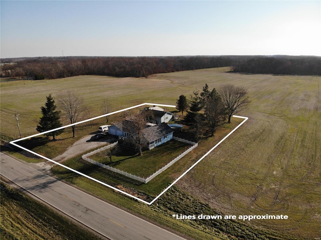 birds eye view of property featuring a rural view