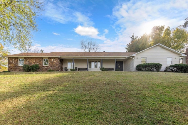 ranch-style house featuring a front lawn