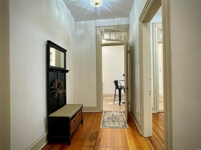 hall with light wood-type flooring