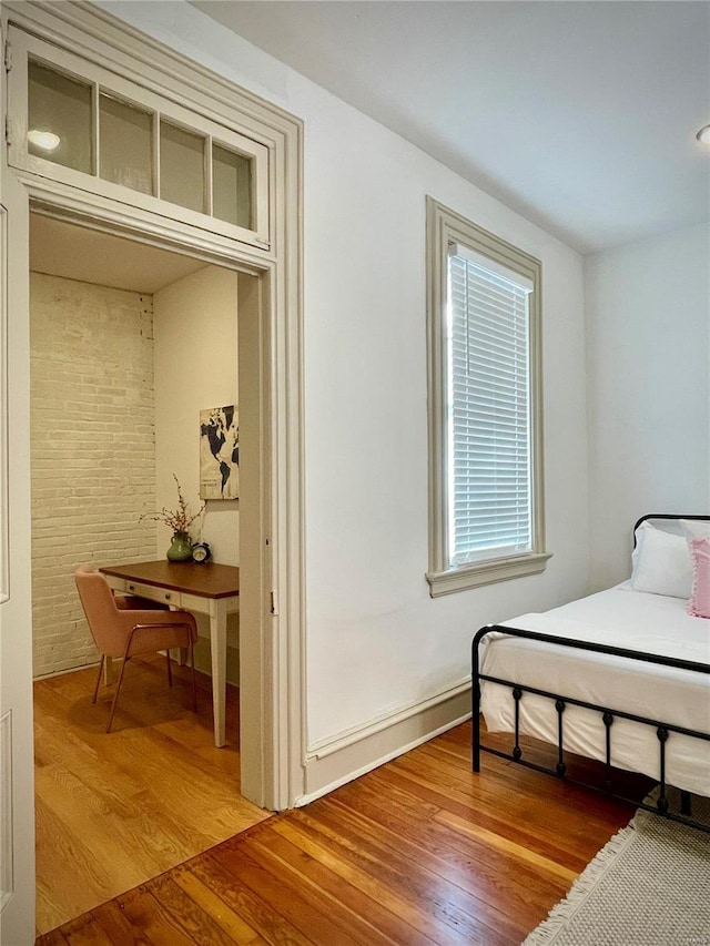 bedroom featuring wood-type flooring