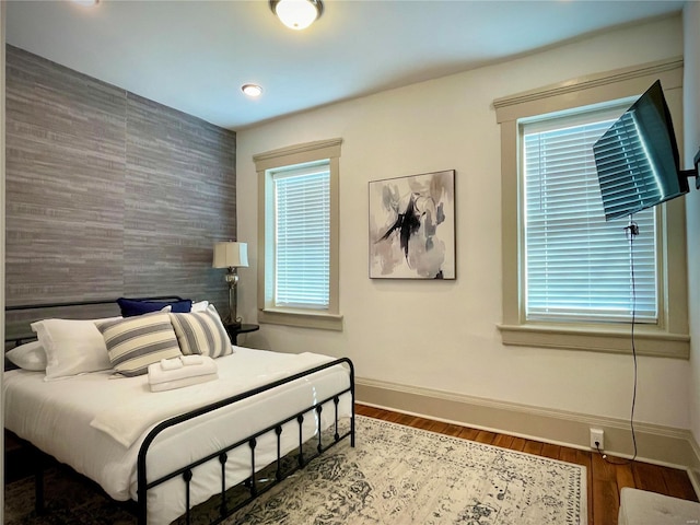 bedroom featuring hardwood / wood-style floors