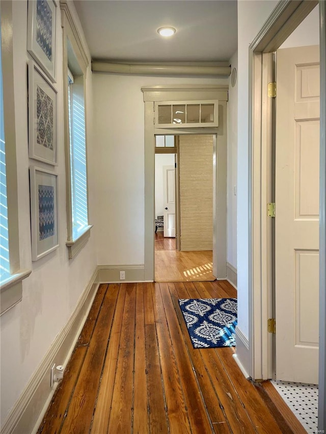 corridor featuring hardwood / wood-style flooring