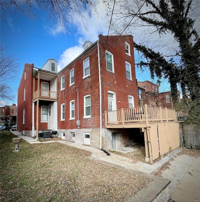 view of building exterior featuring central AC