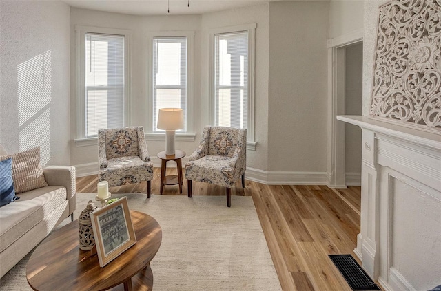 living area featuring light hardwood / wood-style floors