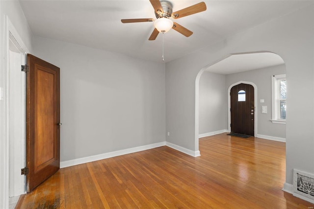 entryway with light hardwood / wood-style floors and ceiling fan