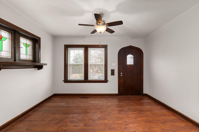 entryway featuring dark hardwood / wood-style flooring and ceiling fan