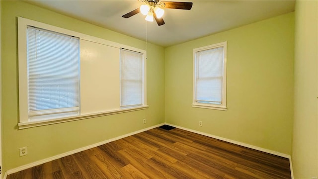 unfurnished room with hardwood / wood-style floors and ceiling fan