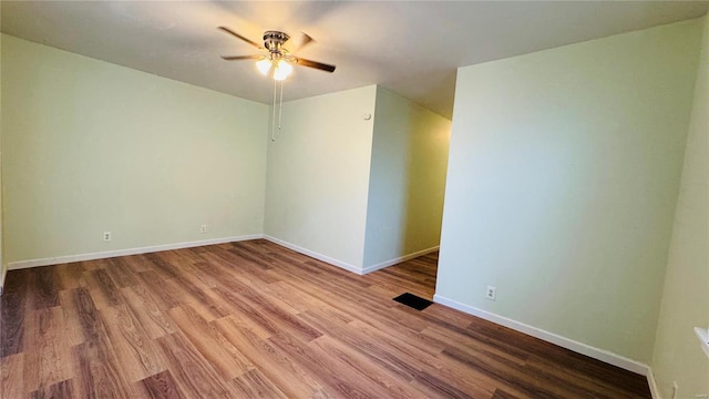 unfurnished room with ceiling fan and light hardwood / wood-style floors