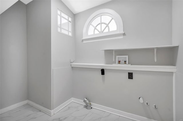 clothes washing area featuring gas dryer hookup and washer hookup