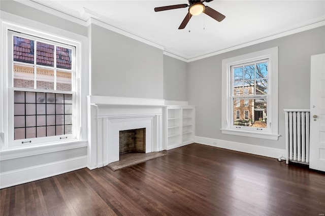 unfurnished living room with ceiling fan, radiator heating unit, dark hardwood / wood-style floors, and ornamental molding