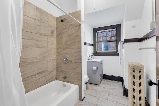 full bathroom featuring shower / bath combo, toilet, and vanity