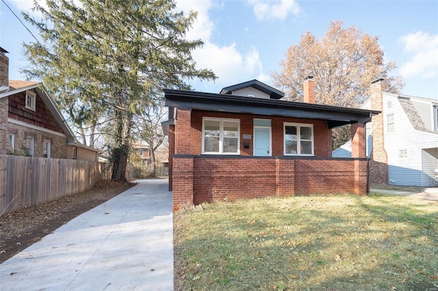 view of front of home with a front yard