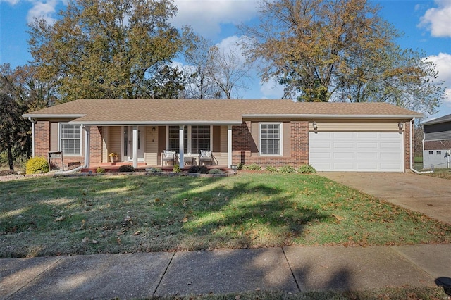 ranch-style house with a garage, covered porch, and a front lawn