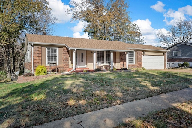 single story home with a front yard and a garage