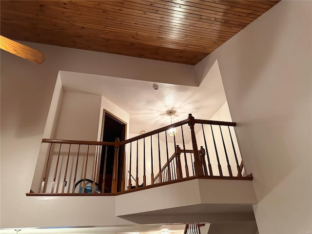 staircase featuring wood ceiling