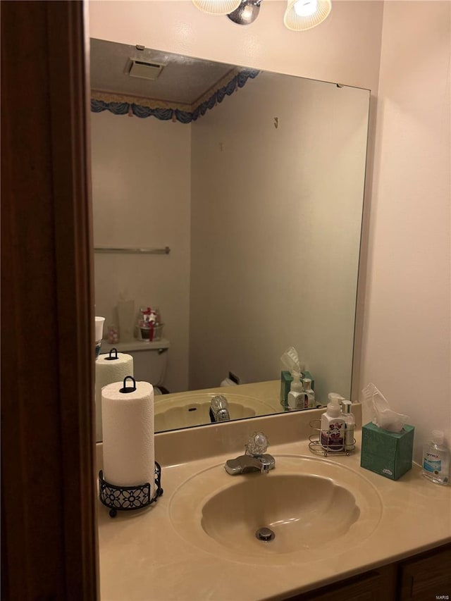 bathroom with toilet and sink