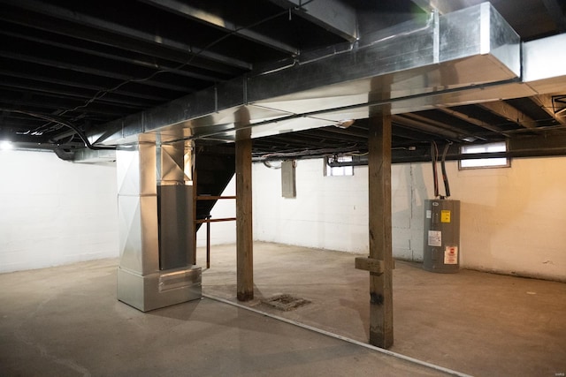 basement with heating unit and water heater