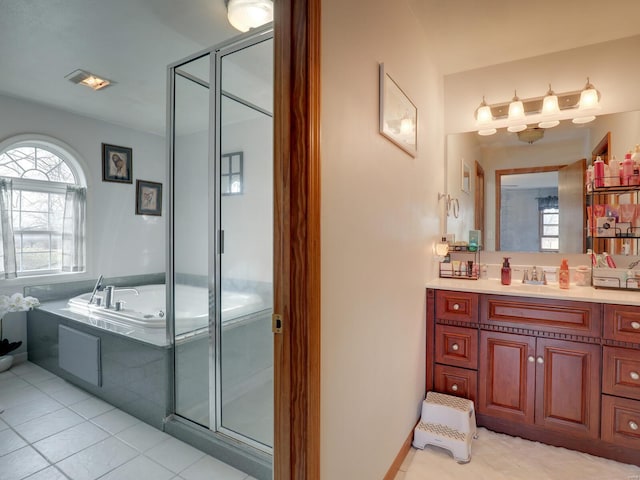 full bath featuring visible vents, a garden tub, tile patterned flooring, vanity, and a shower stall