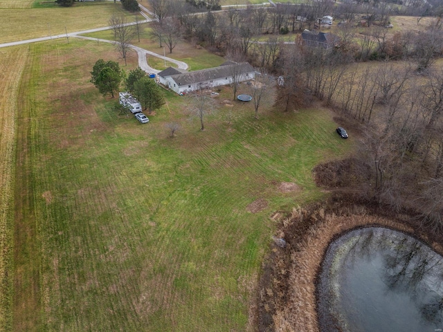 birds eye view of property with a rural view