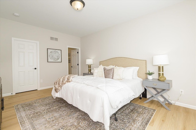 bedroom with light wood-type flooring