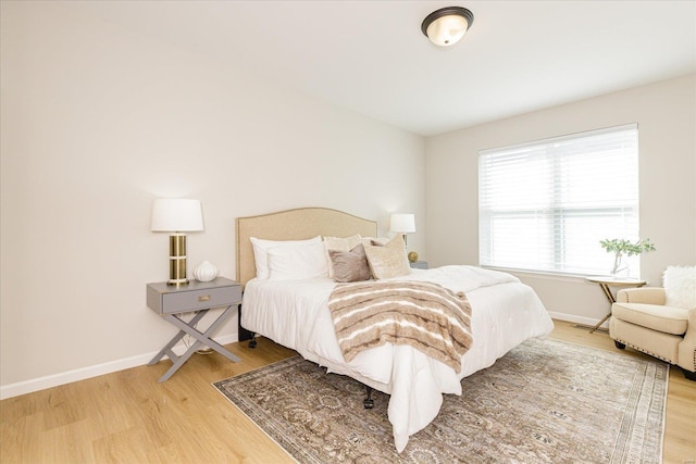 bedroom featuring hardwood / wood-style floors