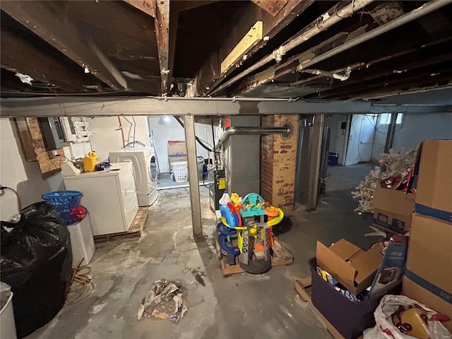 basement with separate washer and dryer