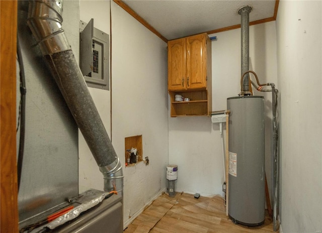 utility room featuring electric panel and water heater