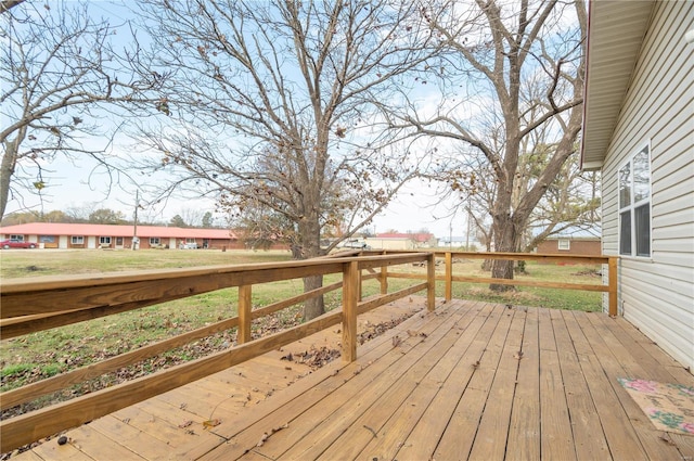 deck featuring a lawn