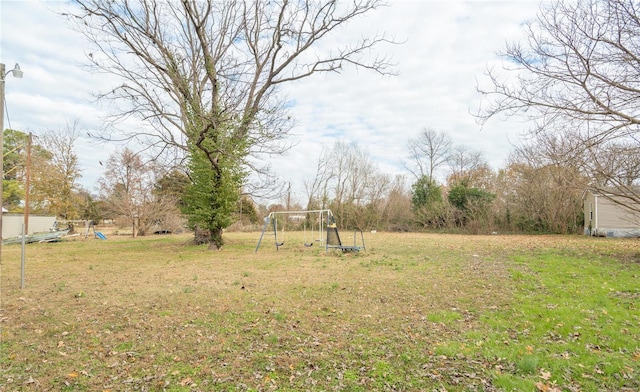 view of yard with a playground