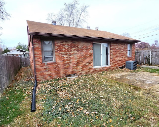 back of house with cooling unit