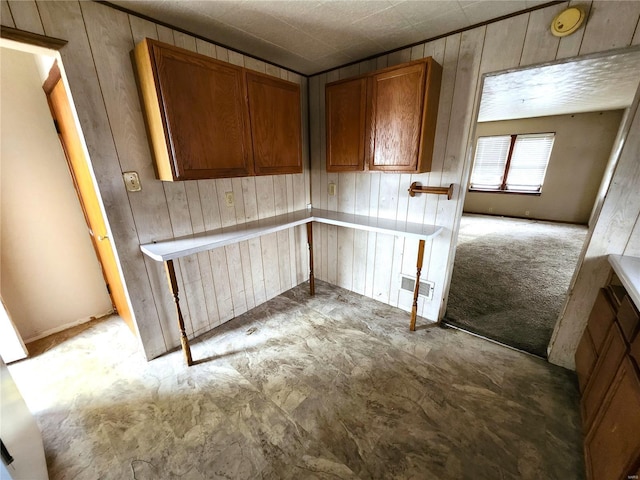 kitchen with wood walls