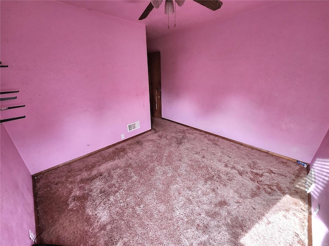 unfurnished room with carpet floors and ceiling fan