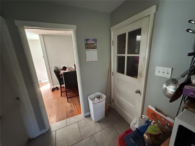 bathroom with hardwood / wood-style floors