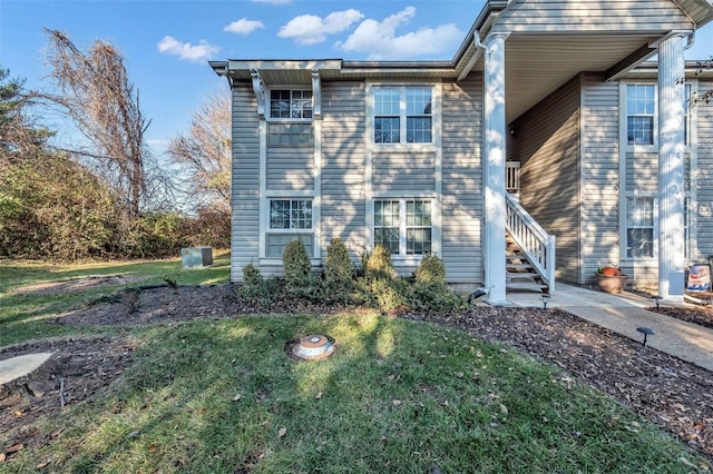 exterior space featuring a front lawn