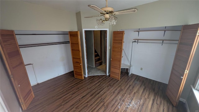 unfurnished bedroom featuring dark wood-type flooring and ceiling fan