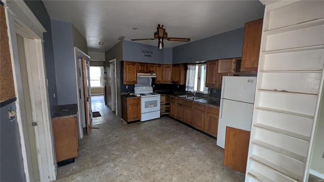 kitchen featuring sink, white appliances, and ceiling fan