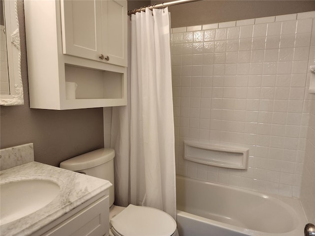 full bathroom featuring vanity, shower / tub combo, and toilet