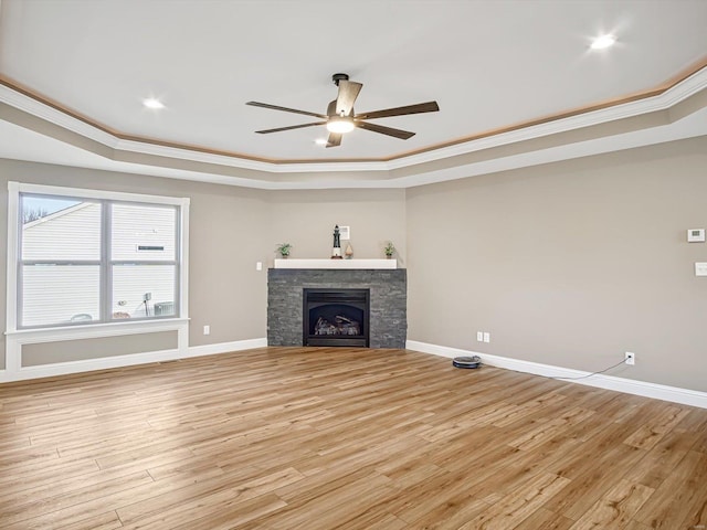 unfurnished living room featuring light hardwood / wood-style flooring and crown molding