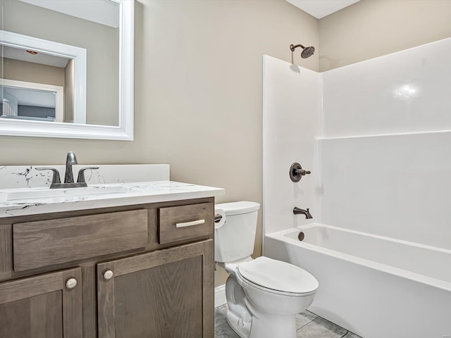 full bathroom with tile patterned flooring, vanity,  shower combination, and toilet