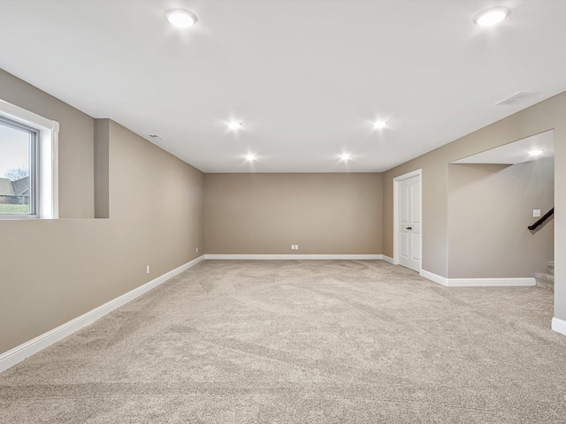 basement with light carpet