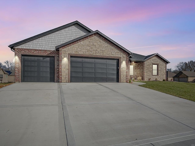 ranch-style home featuring a garage