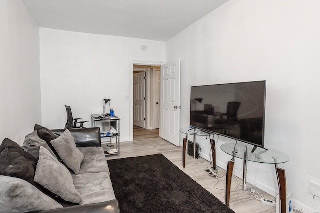 living room with light hardwood / wood-style floors