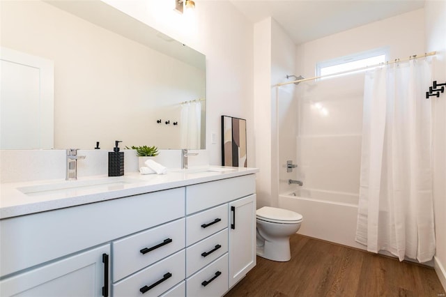 full bathroom featuring shower / tub combo with curtain, vanity, wood-type flooring, and toilet