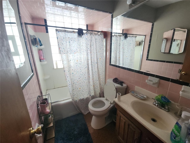 full bathroom with toilet, shower / bathtub combination with curtain, tile walls, and vanity