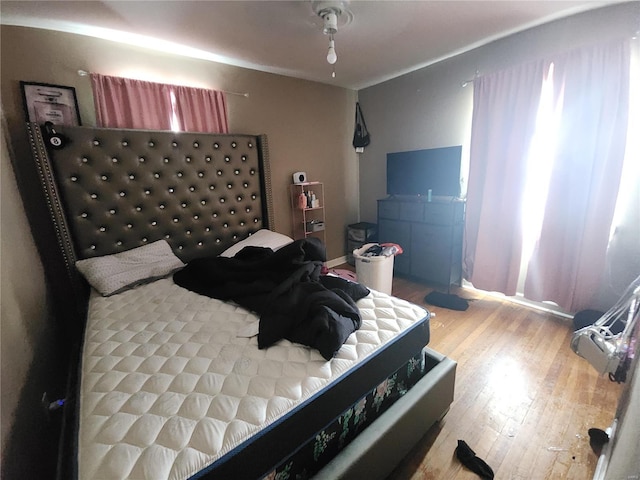 bedroom featuring light wood finished floors