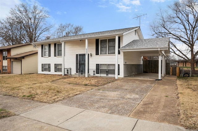 split foyer home with a carport