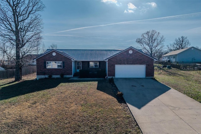 ranch-style home with a front yard and a garage