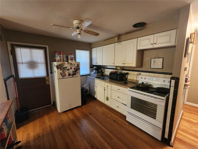 kitchen featuring sink, white appliances, ceiling fan, white cabinetry, and hardwood / wood-style floors